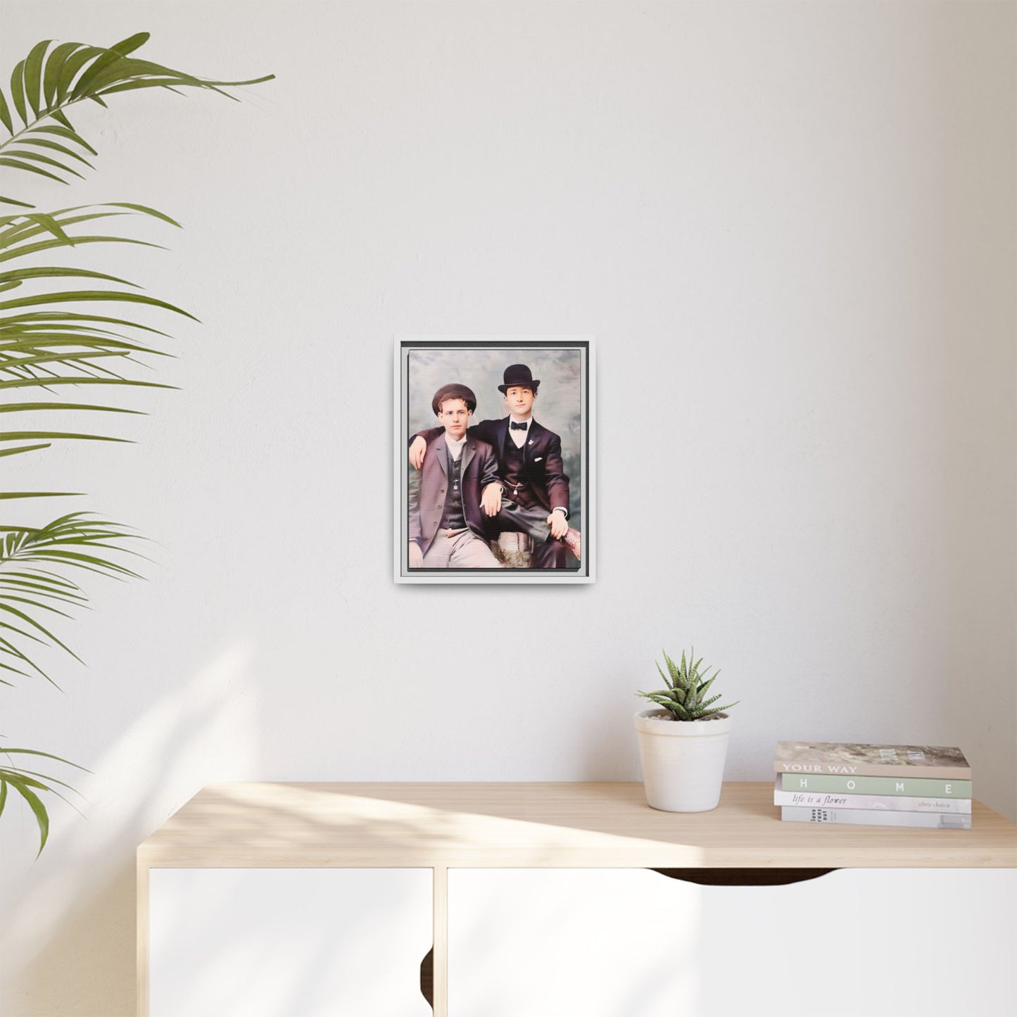 A stunningly restored early 20th-century portrait of Francis and Fai in Santa Barbara, California. Dressed in elegant bowler hats and classic suits, the two men share a poised yet deeply connected moment. The soft pastel tones and refined attire highlight a timeless love story, celebrating LGBTQ+ history and authentic companionship. Gay Couple