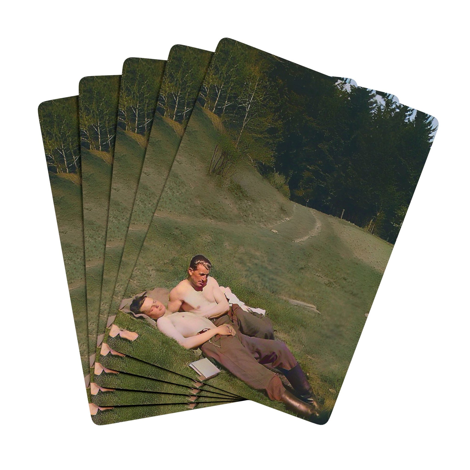 Vintage WWII photo of two soldiers reclining together on a hillside, symbolizing Queer love and resilience during wartime.