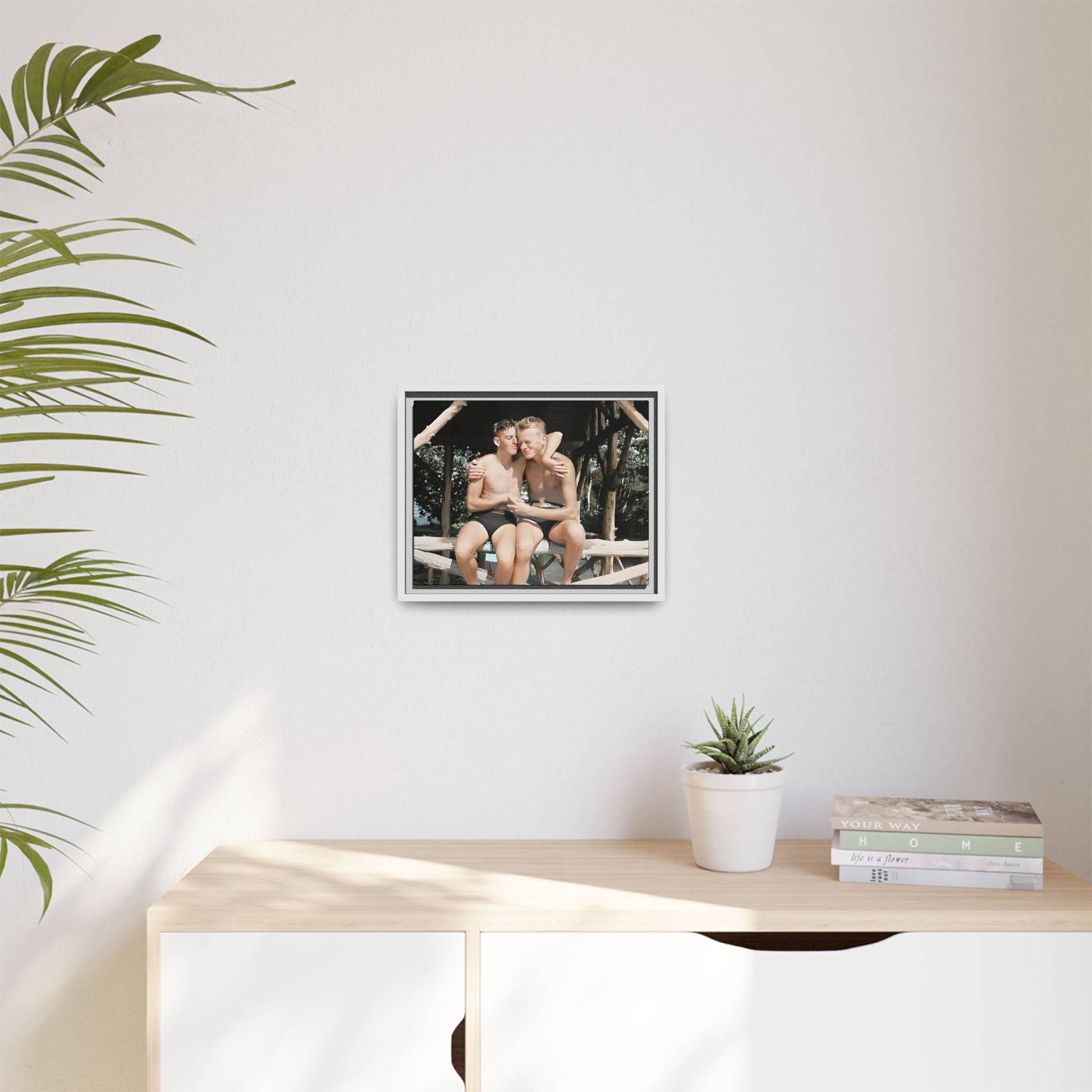 A vintage-inspired framed canvas print featuring Joseph and Billy at Kahena Beach, Hawaii. Their intimate moment under a sunlit pergola captures the warmth of love, freedom, and tropical serenity—perfect for coastal, LGBTQ+, and romantic home decor.
