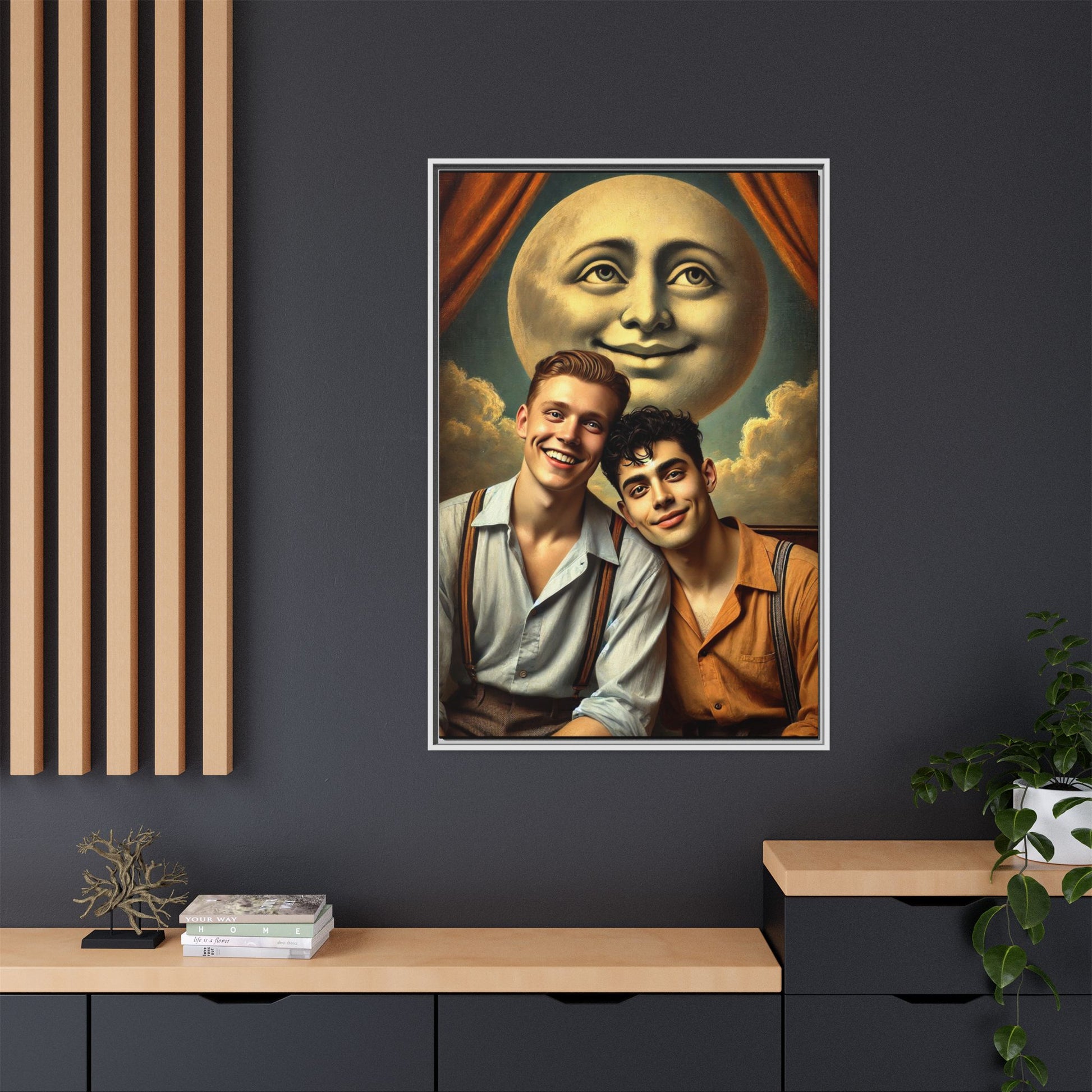 Framed artwork featuring a joyful queer couple in 1930s attire, seated close together beneath a smiling full moon in a theatrical studio setting. A celebration of reclaimed LGBTQ+ narratives in nostalgic portraiture.