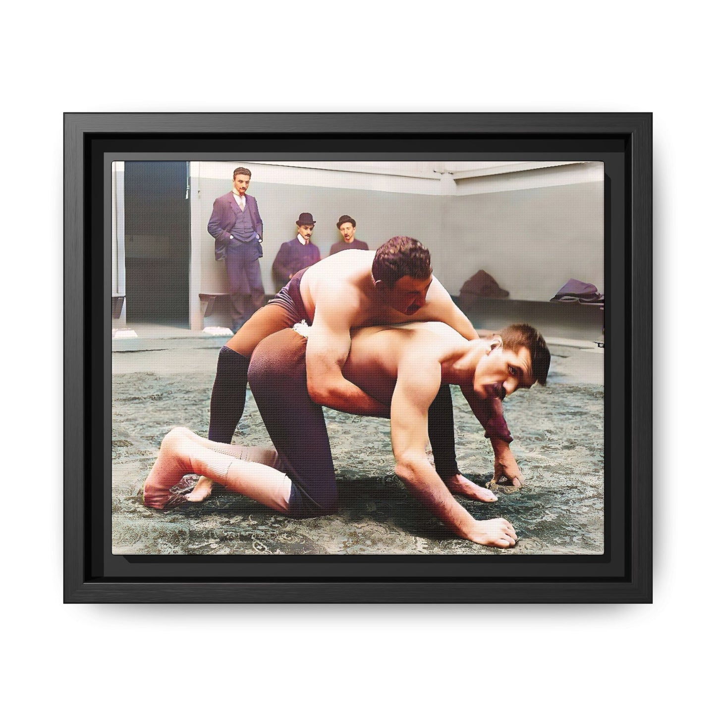 A framed vintage wrestling photograph on matte canvas featuring a Victorian-era match at Love’s Wrestling Club in Plumstead, UK, capturing strength and camaraderie.