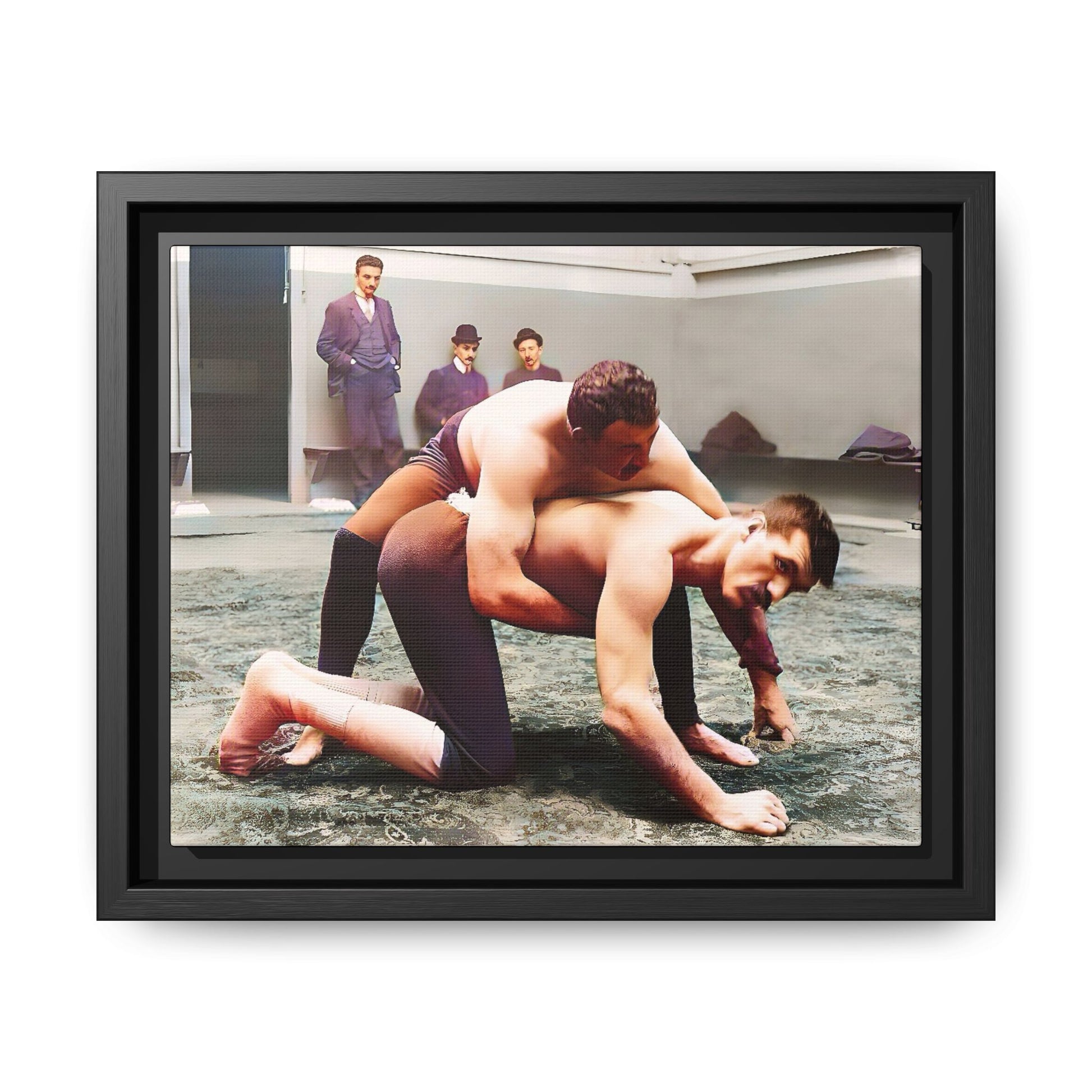 A framed vintage wrestling photograph on matte canvas featuring a Victorian-era match at Love’s Wrestling Club in Plumstead, UK, capturing strength and camaraderie.