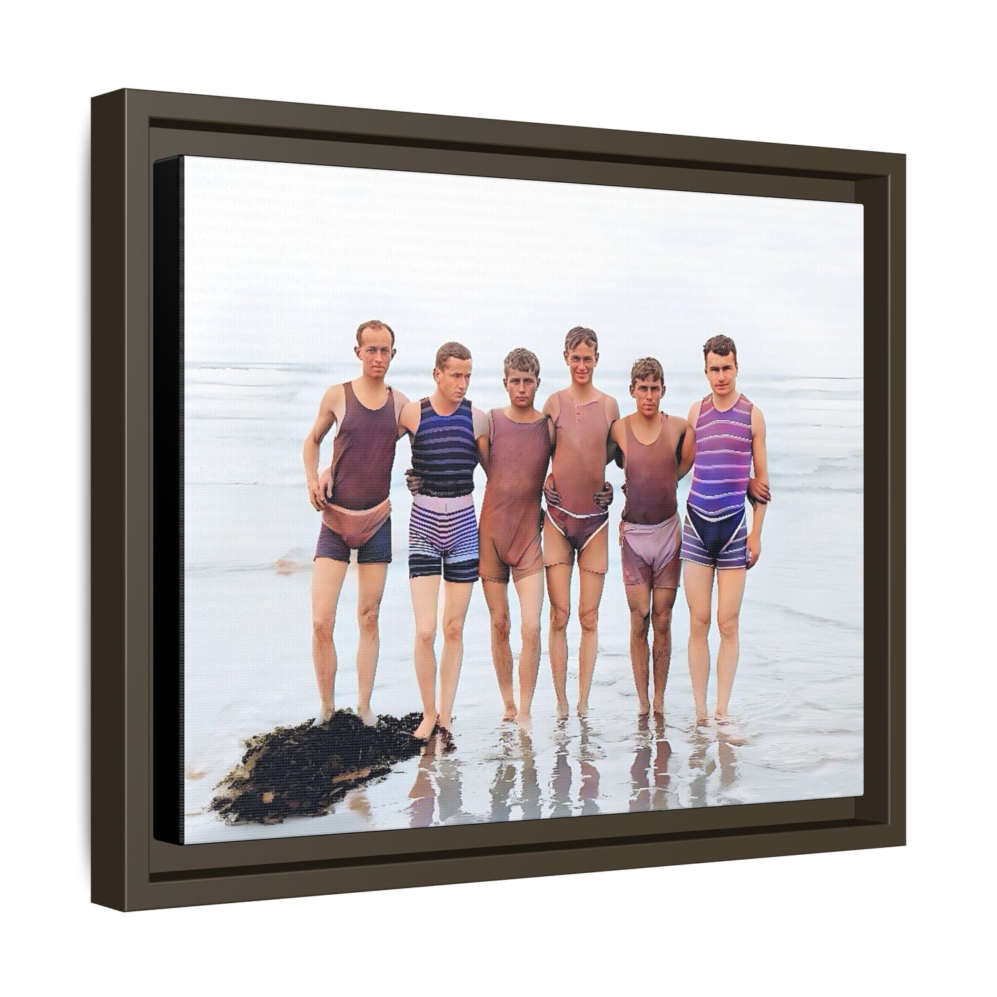 A framed vintage beach portrait on matte canvas featuring a joyful group at Herring Cove Beach, Provincetown, capturing timeless summer camaraderie.