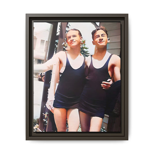 A beautifully restored vintage beach photo of two friends, Lee and Clifford, in classic black swimsuits, walking along Ocean Grove, New Jersey. Their smiles and relaxed body language capture the carefree joy of 1920s summer days, set against a charming coastal backdrop. Gay Couple