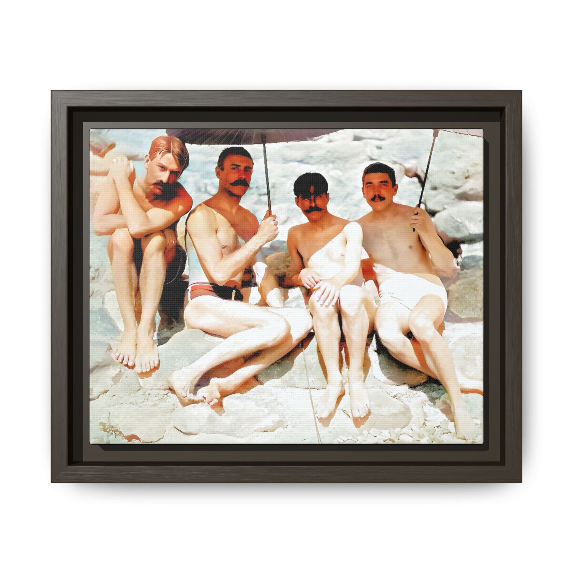 A nostalgic vintage beach photograph from Herring Cove Beach, Provincetown, MA. This framed canvas print captures four men in a relaxed summer moment, perfect for coastal home decor or as an LGBTQ+ history tribute.