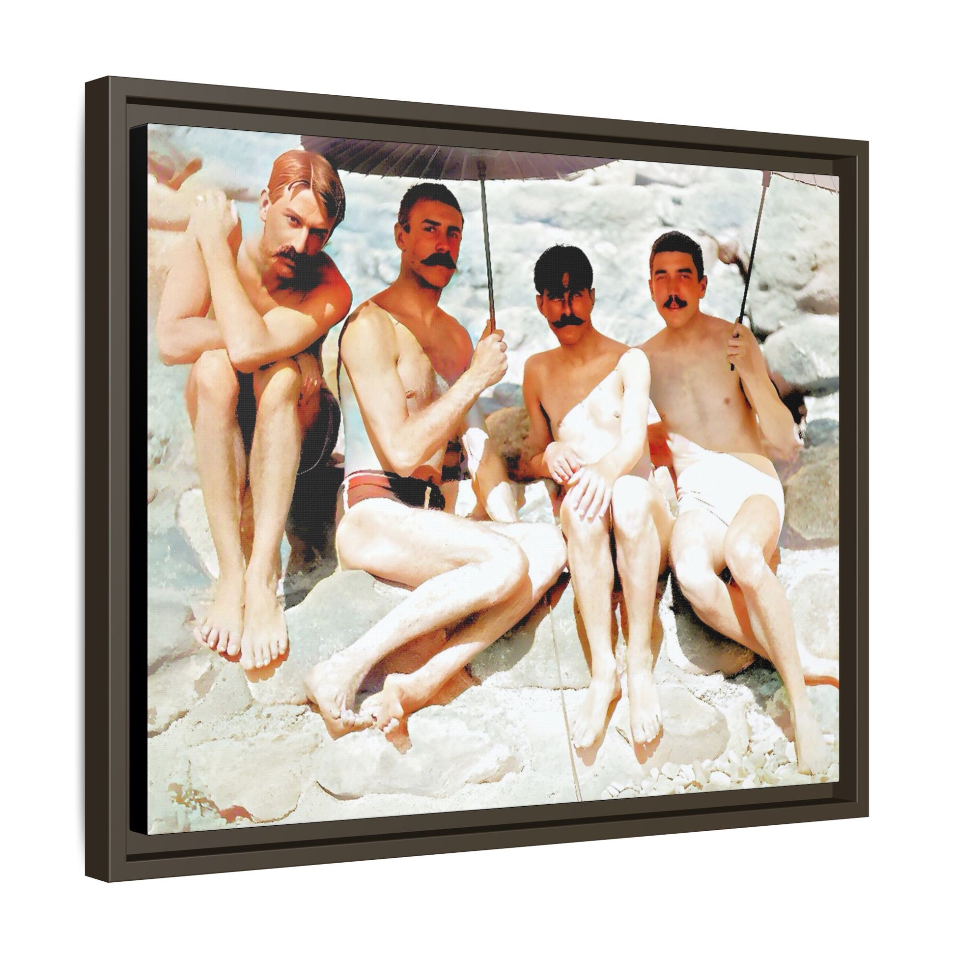 A nostalgic vintage beach photograph from Herring Cove Beach, Provincetown, MA. This framed canvas print captures four men in a relaxed summer moment, perfect for coastal home decor or as an LGBTQ+ history tribute.