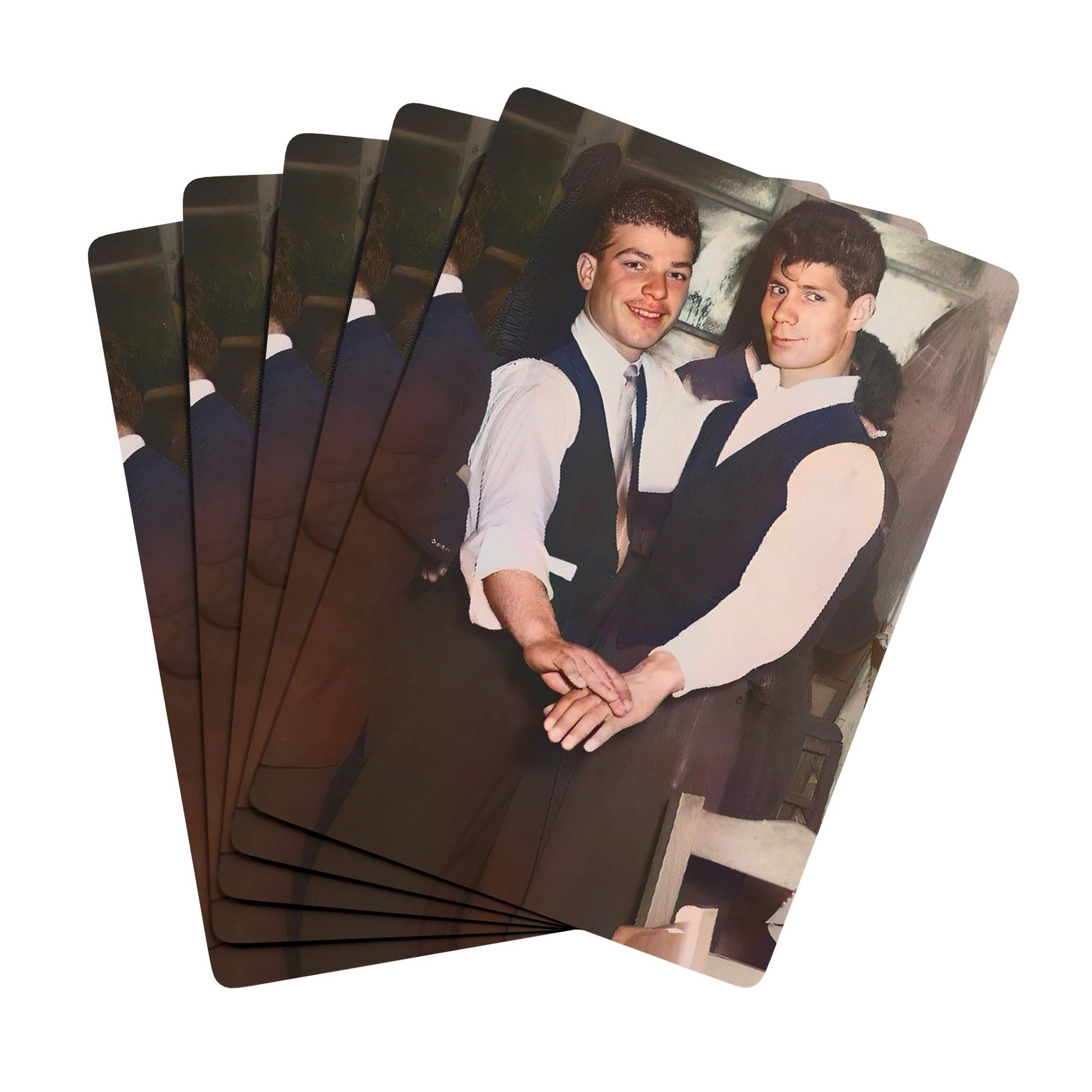 Vintage photo of a stylish gay couple in formal attire, clasping hands in a dance, symbolizing Queer love and joy.
