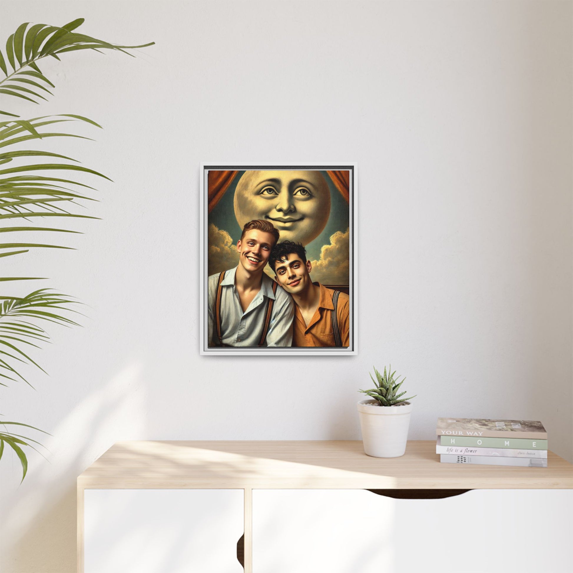 Framed artwork featuring a joyful queer couple in 1930s attire, seated close together beneath a smiling full moon in a theatrical studio setting. A celebration of reclaimed LGBTQ+ narratives in nostalgic portraiture.