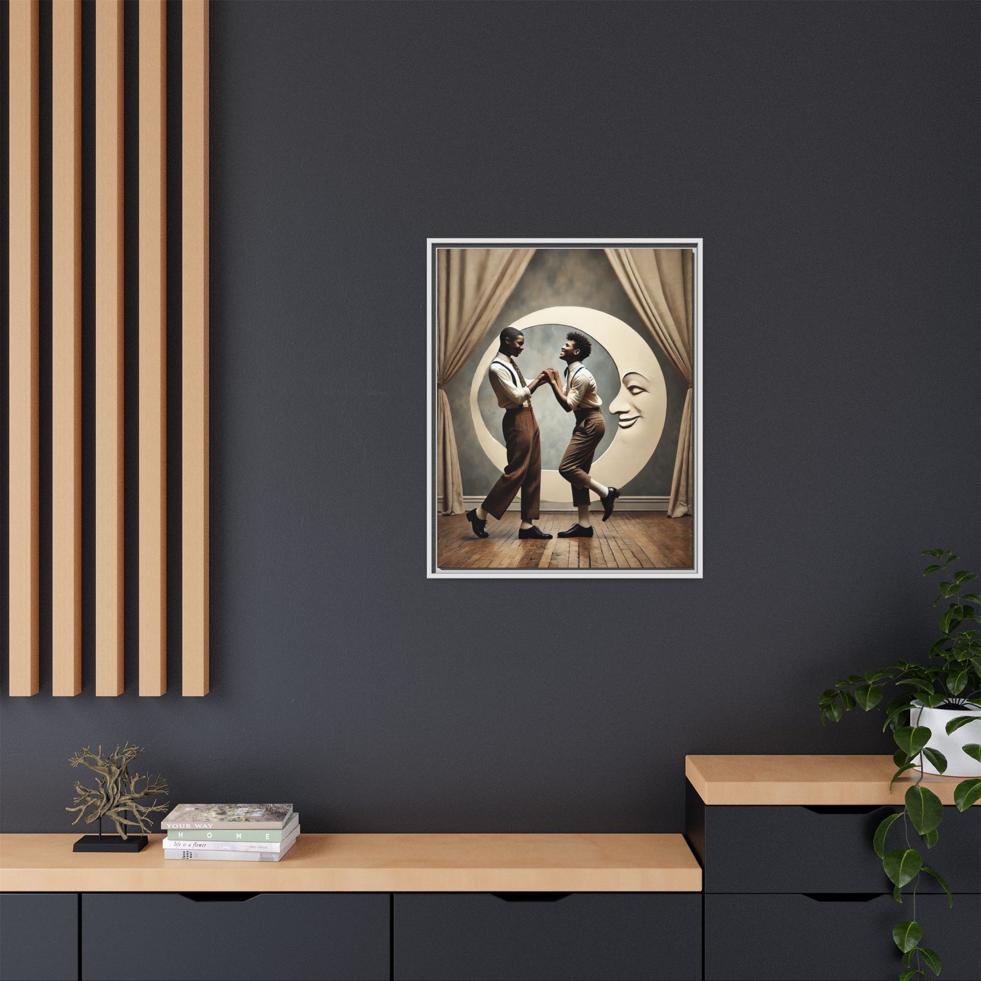 Two joyful young Black men dressed in 1920s fashion dancing in front of a crescent moon prop with a smiling face. This artwork reclaims erased queer love, offering a whimsical and powerful celebration of Black LGBTQ+ youth and history.
