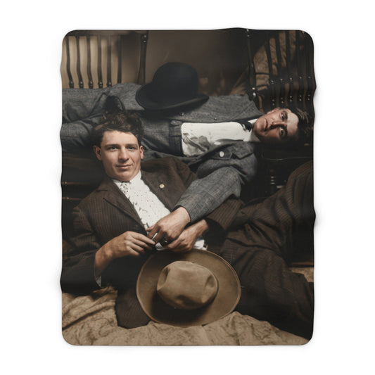 Cozy fleece throw with restored studio scene, chairs, hats, and tailored menswear