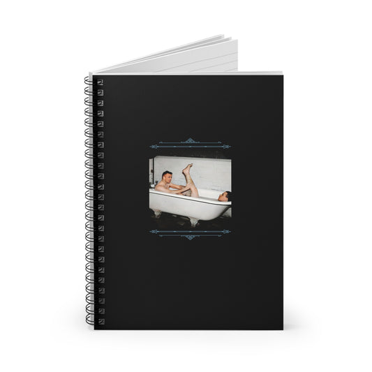 Black spiral notebook showing vintage gay couple lounging in a white clawfoot tub with joyful expressions