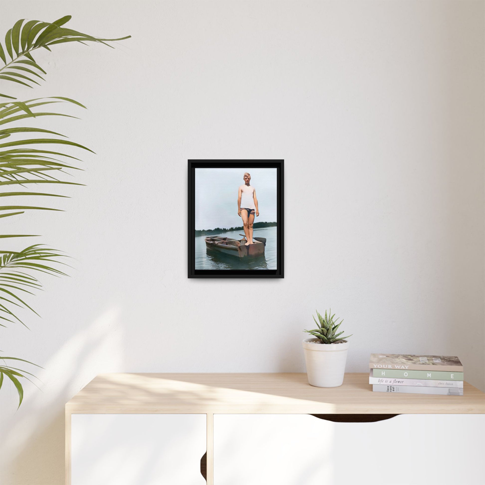 A framed vintage lake portrait on matte canvas featuring George standing on a rowboat at Creve Coeur Lake, Missouri, capturing timeless outdoor nostalgia.