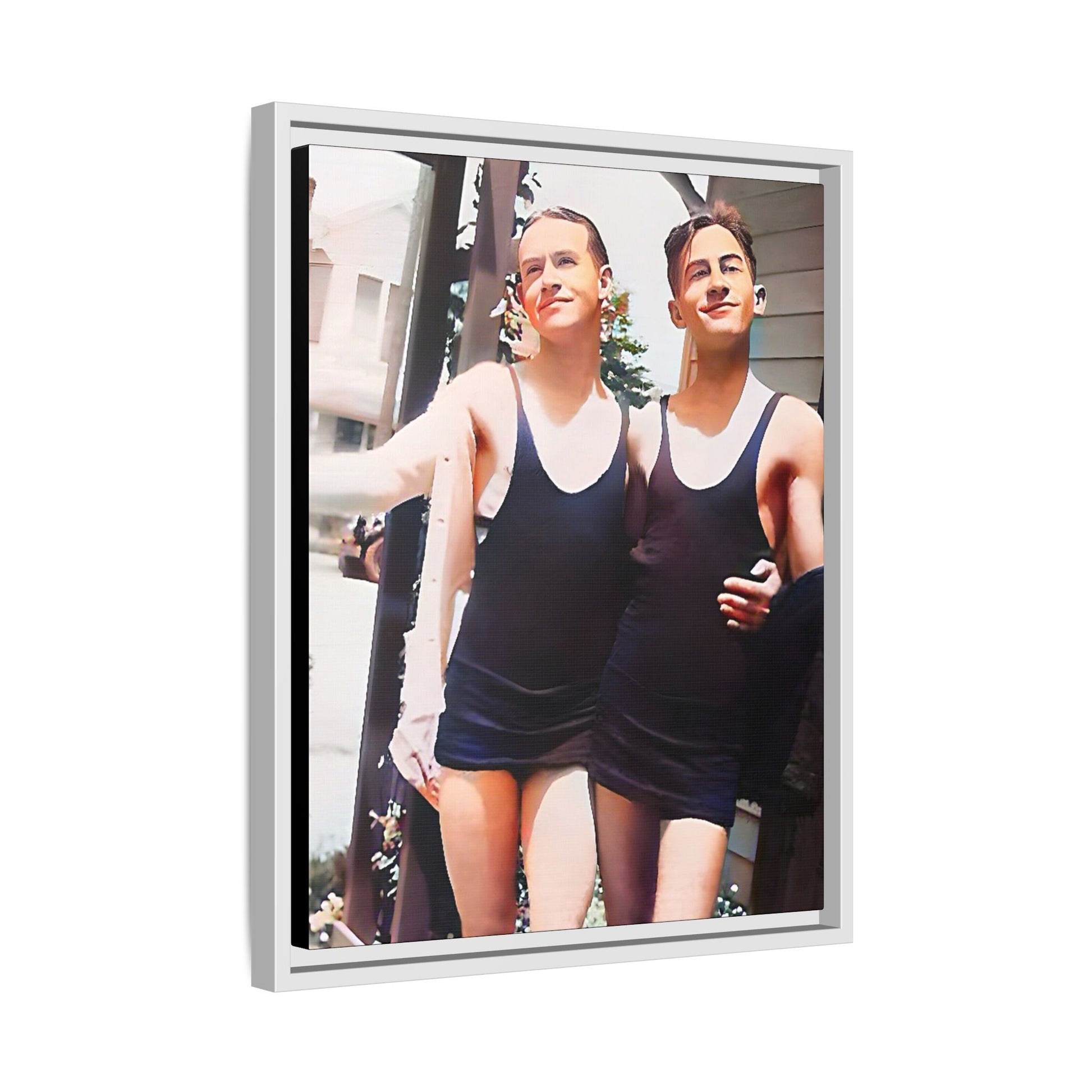 A beautifully restored vintage beach photo of two friends, Lee and Clifford, in classic black swimsuits, walking along Ocean Grove, New Jersey. Their smiles and relaxed body language capture the carefree joy of 1920s summer days, set against a charming coastal backdrop. Gay Couple
