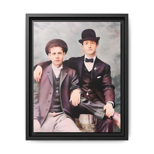 A stunningly restored early 20th-century portrait of Francis and Fai in Santa Barbara, California. Dressed in elegant bowler hats and classic suits, the two men share a poised yet deeply connected moment. The soft pastel tones and refined attire highlight a timeless love story, celebrating LGBTQ+ history and authentic companionship. Gay Couple