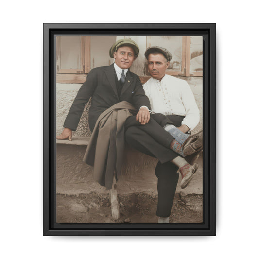 Vintage outdoor double portrait of two seated men in caps beside open windows and a plaster wall