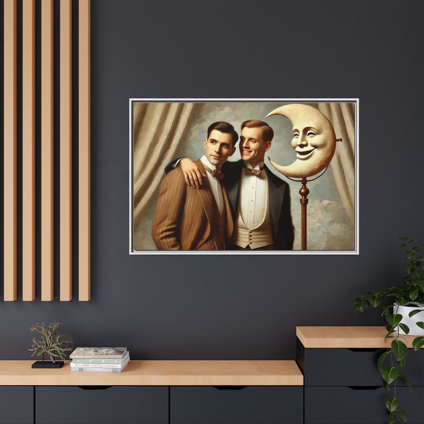 Framed matte canvas artwork of two men in vintage tuxedos standing beside a crescent moon prop. This piece reclaims LGBTQ+ representation lost to bias and honors everyday moments of affection and connection once absent from historical archives.