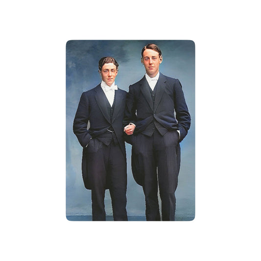 Vintage photo of an elegantly dressed gay couple in tuxedos, interlinked arms symbolizing trust, commitment, and love.