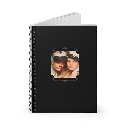 Vintage gay couple in WWII US Marine uniforms share a tender moment in a photo booth on a spiral notebook cover