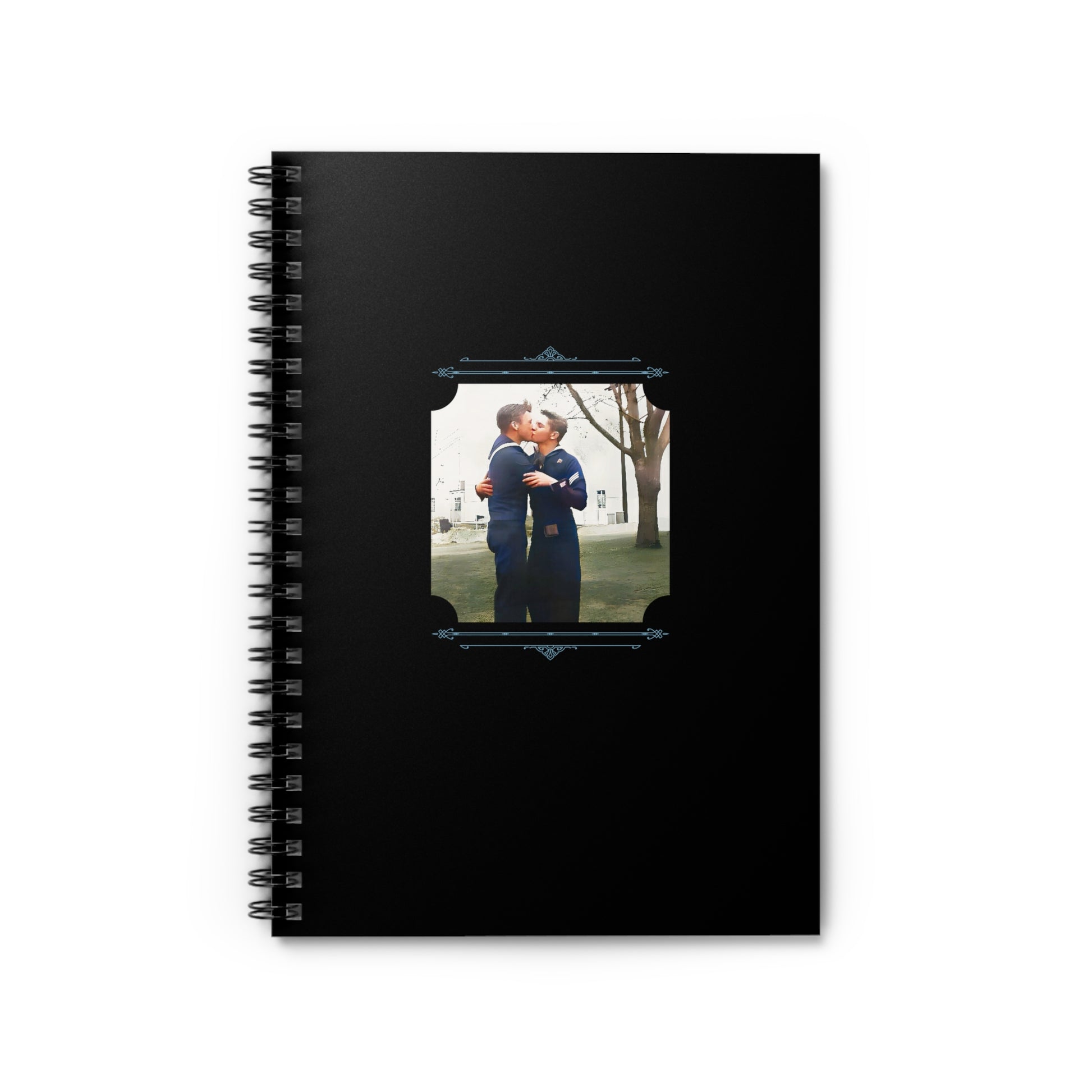 Spiral notebook featuring a vintage WWII photo of two sailors kissing on grass in small-town America.