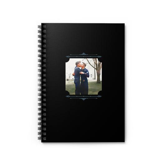 Spiral notebook featuring a vintage WWII photo of two sailors kissing on grass in small-town America.