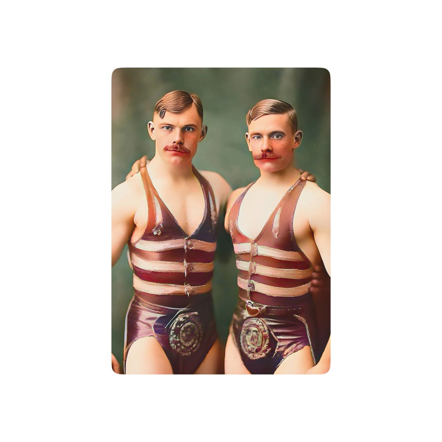 Vintage photo of two muscular men in striped wrestling singlets, standing closely, symbolizing strength, camaraderie, and LGBTQ+ history.