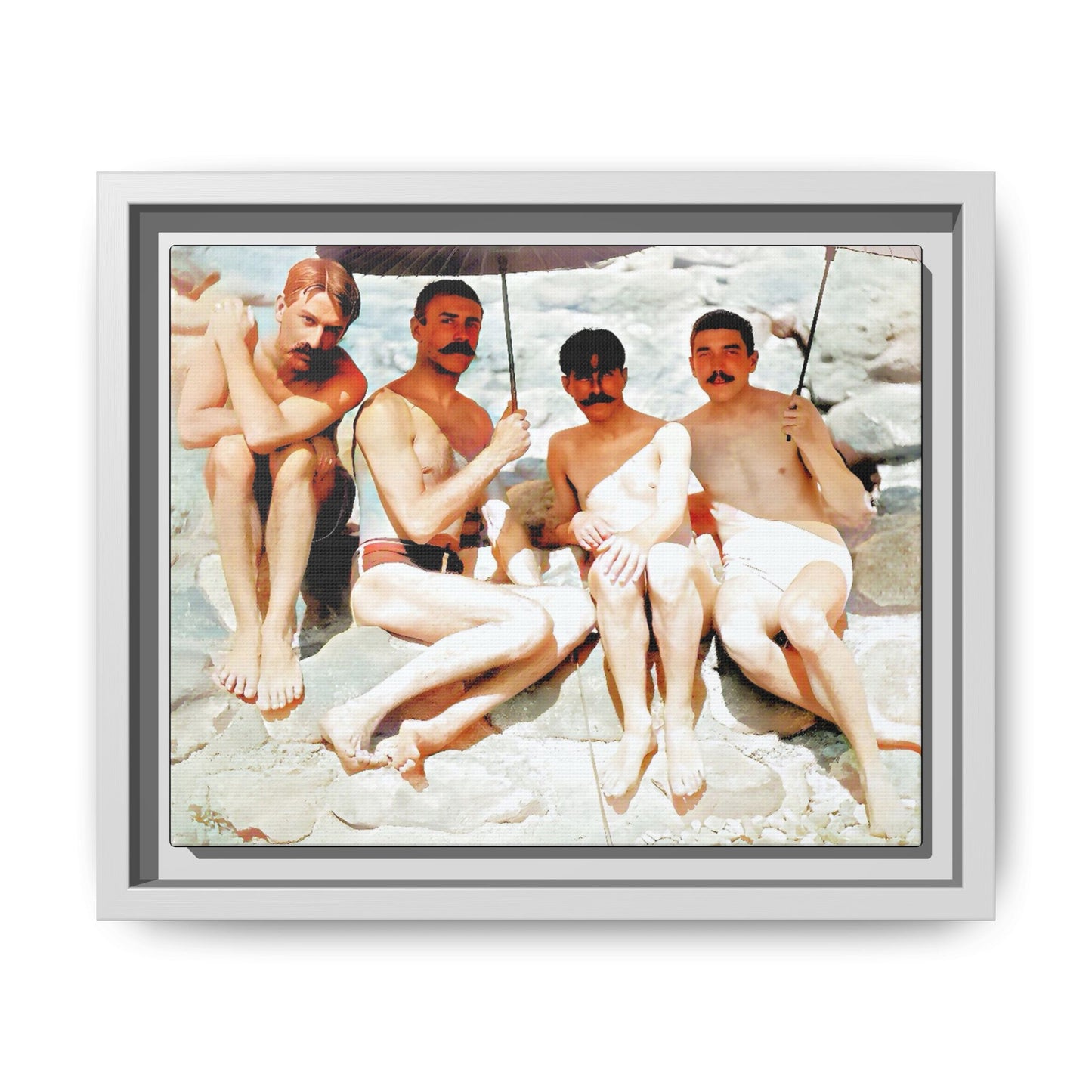 A nostalgic vintage beach photograph from Herring Cove Beach, Provincetown, MA. This framed canvas print captures four men in a relaxed summer moment, perfect for coastal home decor or as an LGBTQ+ history tribute.