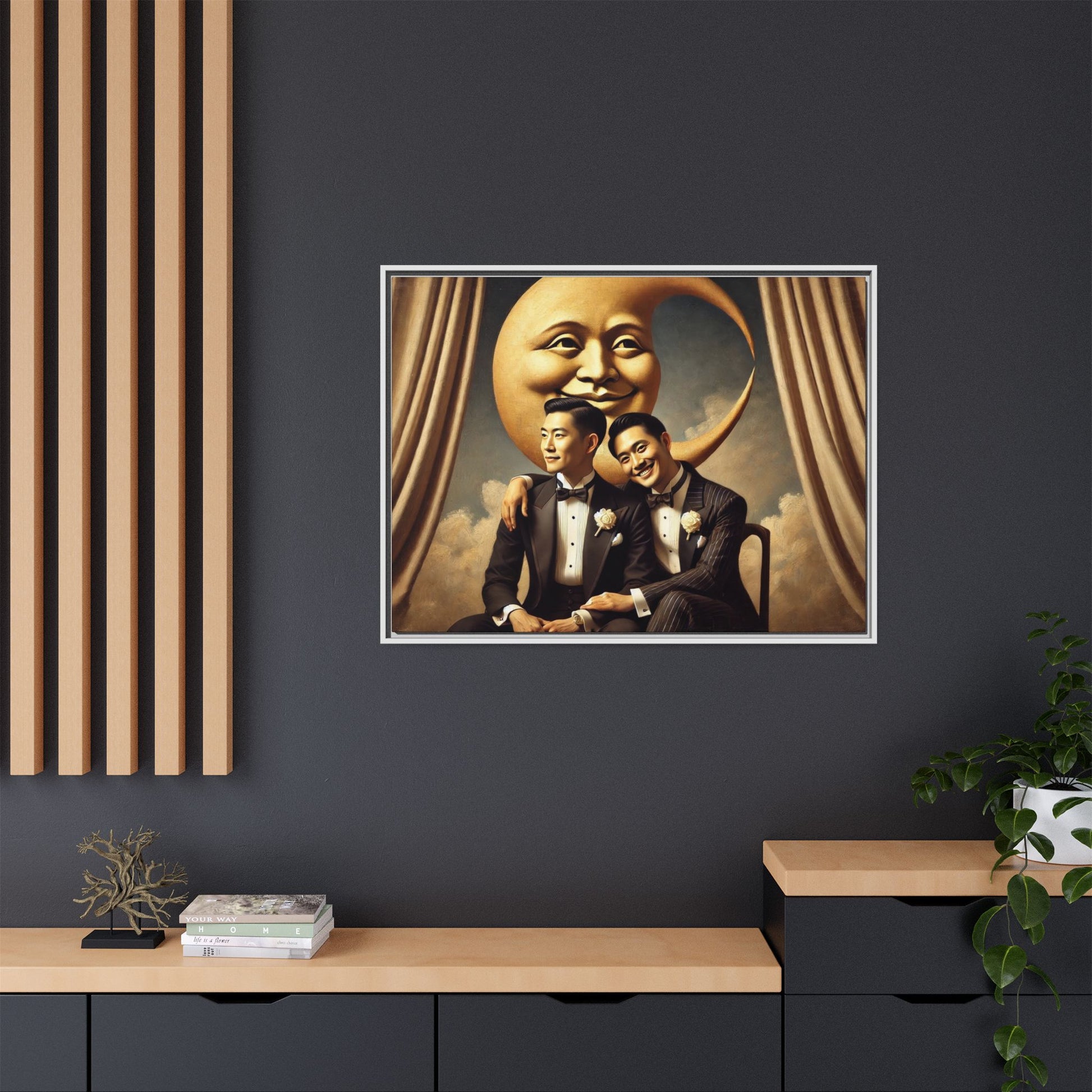 Vintage-inspired artwork of a romantic gay Asian couple in tuxedos sitting affectionately beneath a smiling crescent moon prop, surrounded by vintage stage curtains and dreamy clouds. A reclaimed queer narrative from the Man In The Moon series.