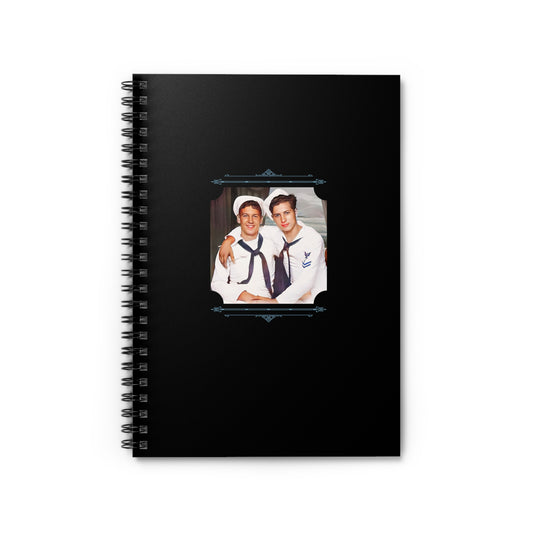 Spiral notebook with WWII-era photo of two young U.S. Navy sailors seated close together, arm in arm.