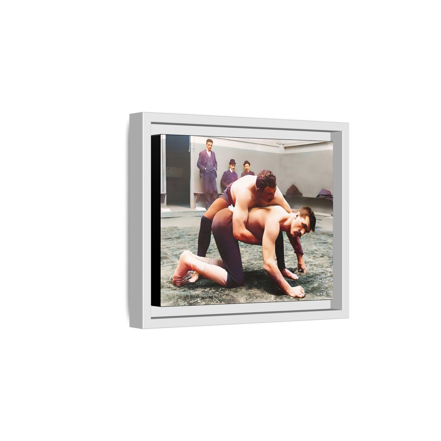 A framed vintage wrestling photograph on matte canvas featuring a Victorian-era match at Love’s Wrestling Club in Plumstead, UK, capturing strength and camaraderie.
