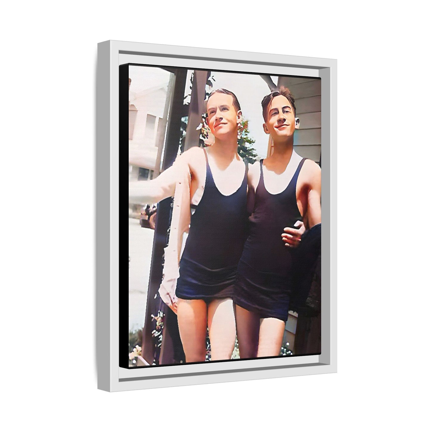 A beautifully restored vintage beach photo of two friends, Lee and Clifford, in classic black swimsuits, walking along Ocean Grove, New Jersey. Their smiles and relaxed body language capture the carefree joy of 1920s summer days, set against a charming coastal backdrop. Gay Couple