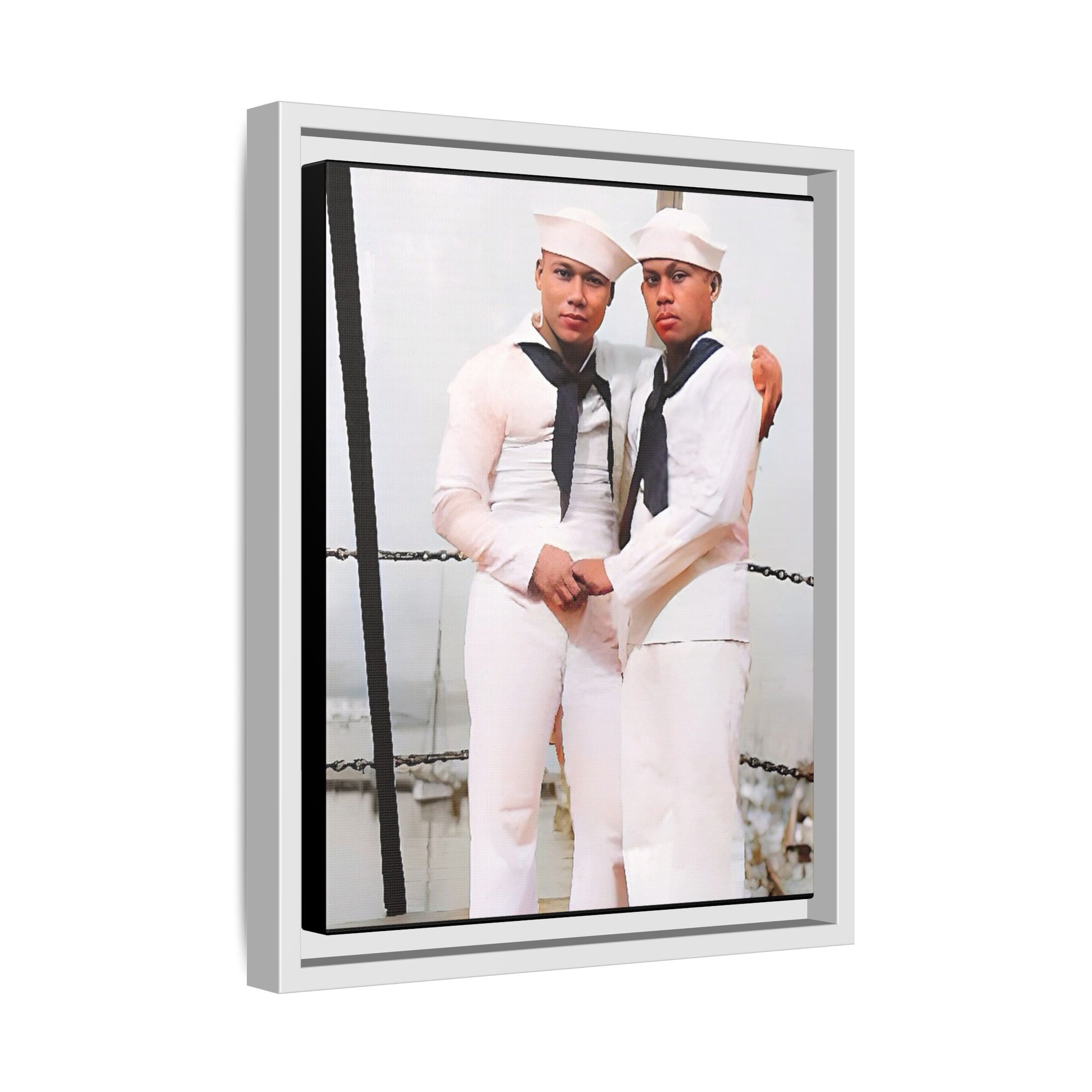A restored vintage photograph of two Navy sailors standing together aboard a naval ship at Apra Harbor, Guam. Dressed in crisp white uniforms, their hands gently clasped, the image captures a quiet moment of strength, devotion, and LGBTQ+ military history.