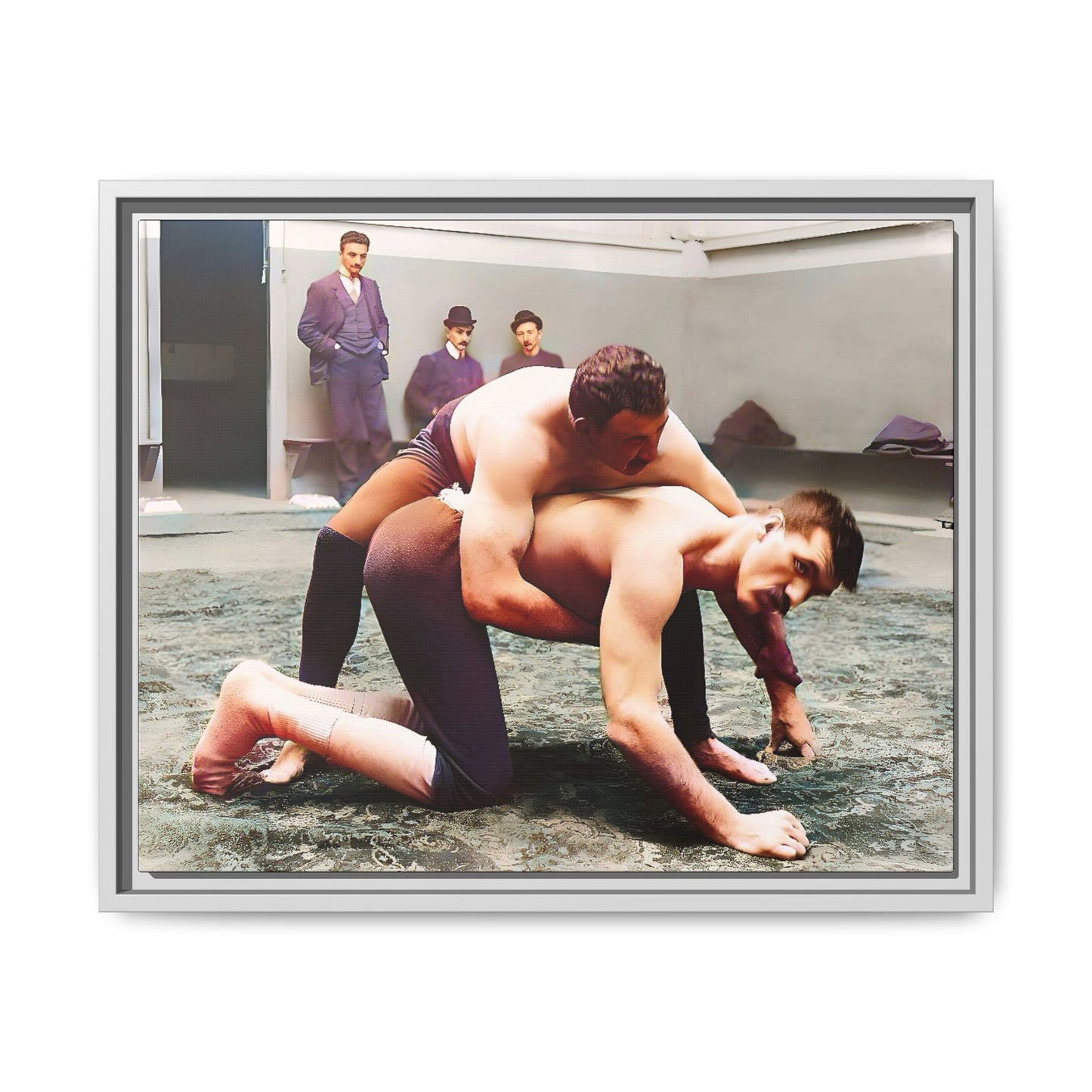A framed vintage wrestling photograph on matte canvas featuring a Victorian-era match at Love’s Wrestling Club in Plumstead, UK, capturing strength and camaraderie.