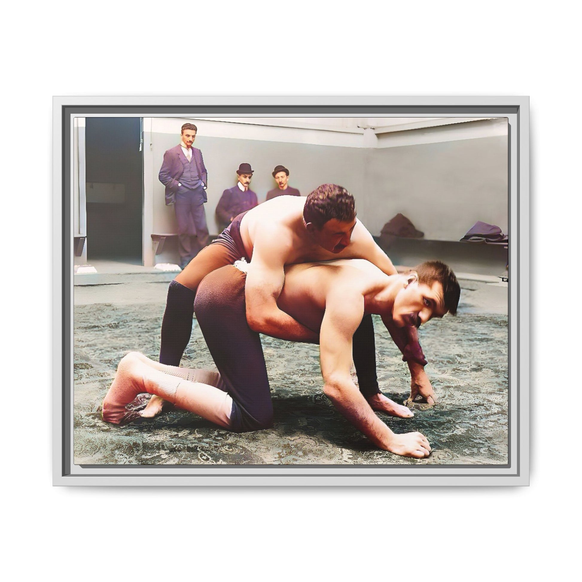A framed vintage wrestling photograph on matte canvas featuring a Victorian-era match at Love’s Wrestling Club in Plumstead, UK, capturing strength and camaraderie.