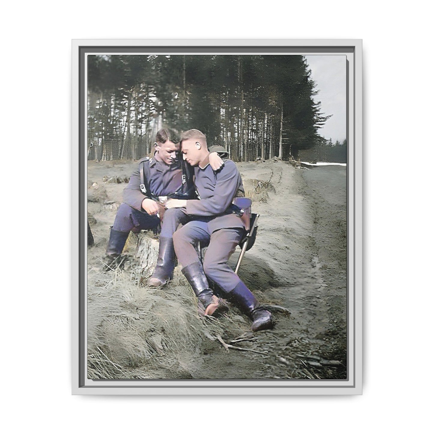 A beautifully restored WWI-era photograph featuring Felix and Engel, two soldiers seated closely on a tree stump in Verdun, France. Dressed in military uniforms with rugged boots, their affectionate expressions and serene forest backdrop capture a rare and intimate moment of connection and resilience during wartime. Vintage Foto Schwules Paar