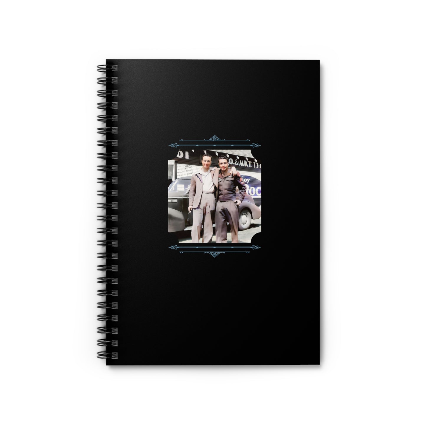 Notebook featuring a vintage WWII-era photo of a gay couple—soldier and civilian—outside a mechanic garage.