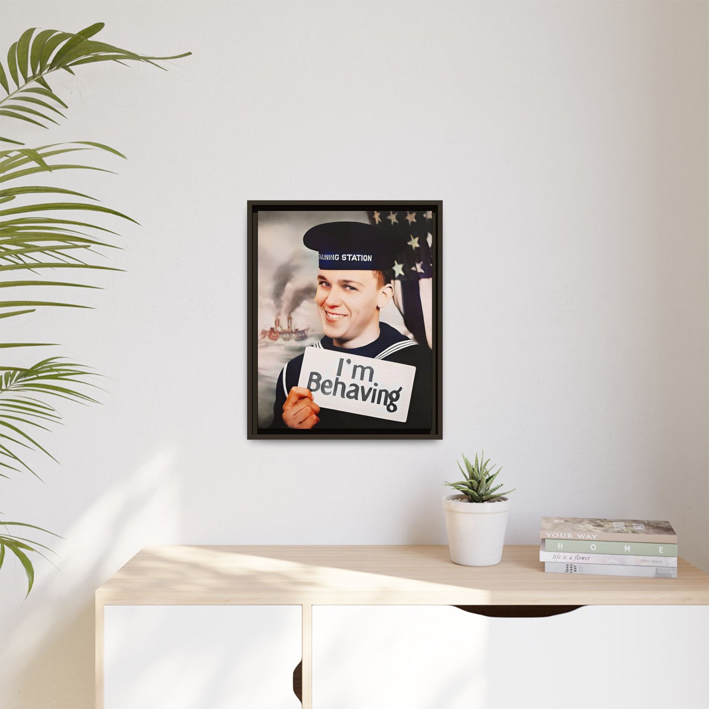 A vintage U.S. Navy sailor portrait featuring Carl at the Washington Navy Yard, grinning while holding a card reading "I'm Behaving." This framed matte canvas print is a charming mix of humor and military history, perfect for collectors and veterans.