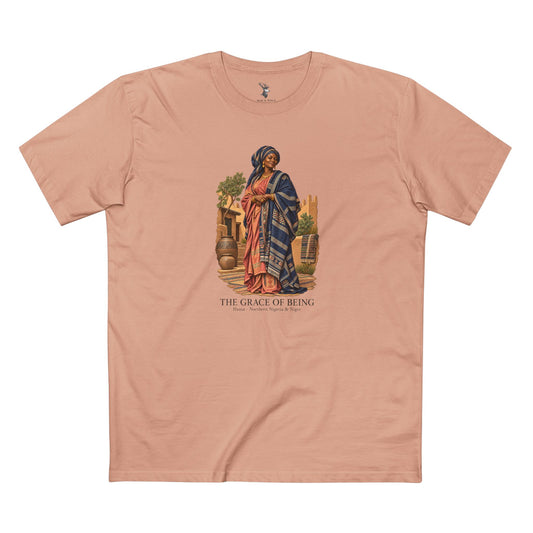 Light T-shirt featuring a Hausa-inspired portrait in indigo and rose clothing, with charcoal lettering reading The Grace of Being, Hausa · Northern Nigeria & Niger.