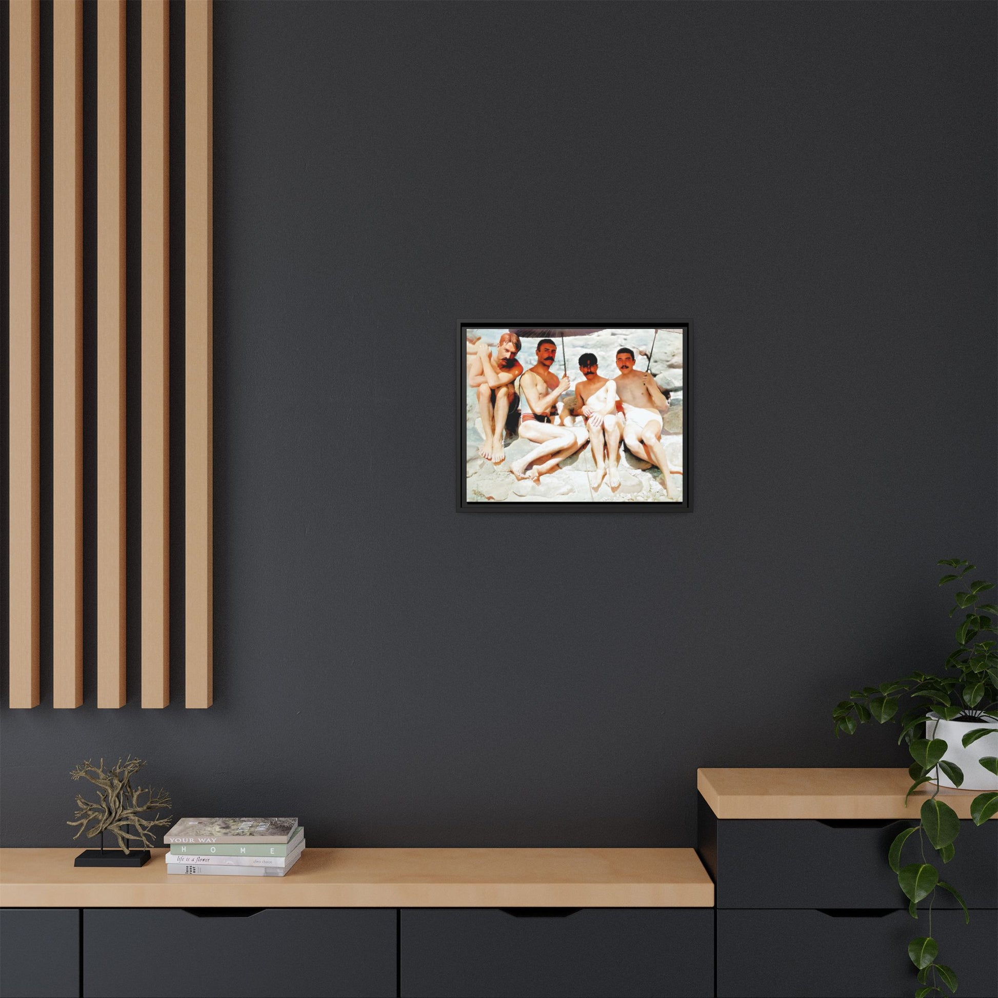 A nostalgic vintage beach photograph from Herring Cove Beach, Provincetown, MA. This framed canvas print captures four men in a relaxed summer moment, perfect for coastal home decor or as an LGBTQ+ history tribute.