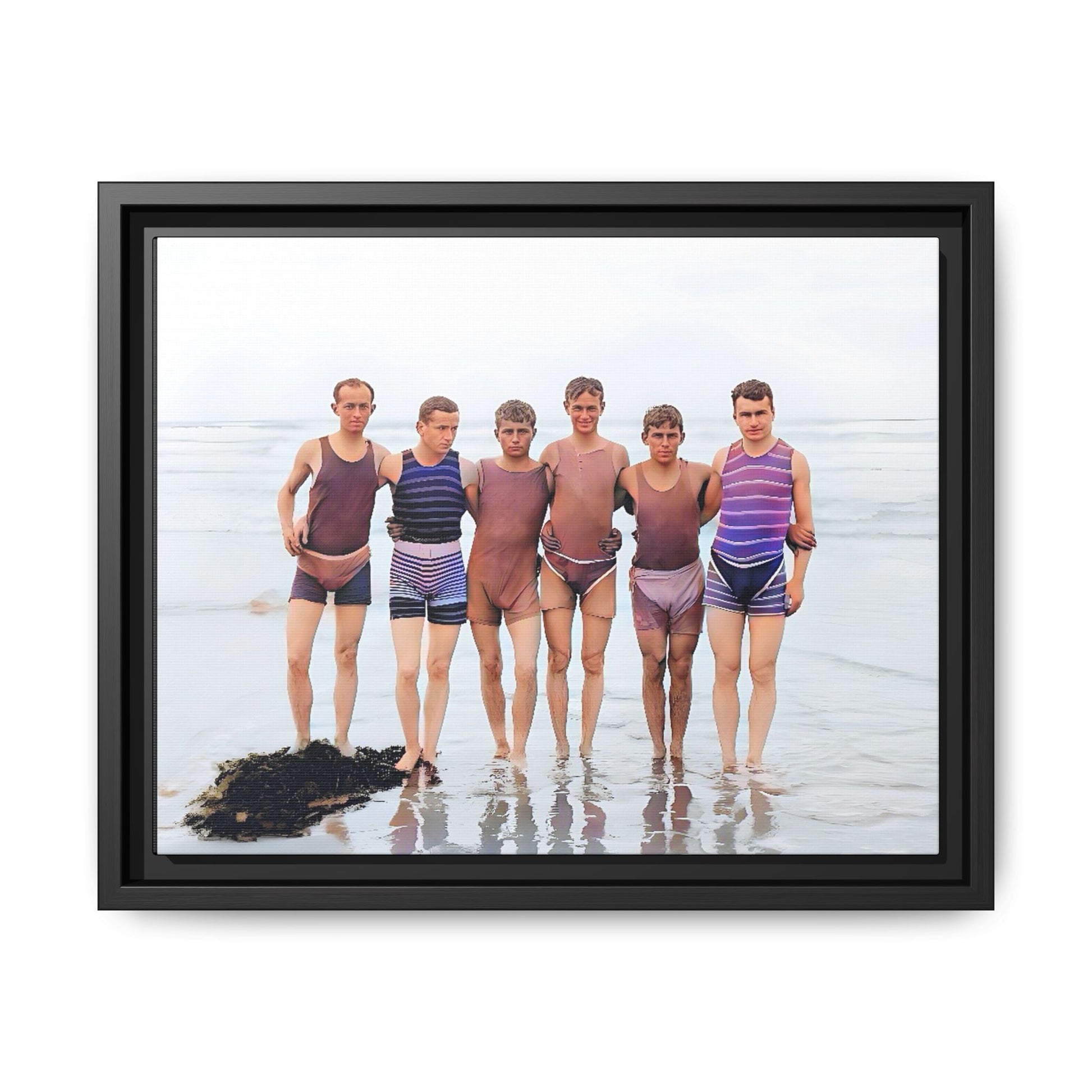 A framed vintage beach portrait on matte canvas featuring a joyful group at Herring Cove Beach, Provincetown, capturing timeless summer camaraderie.