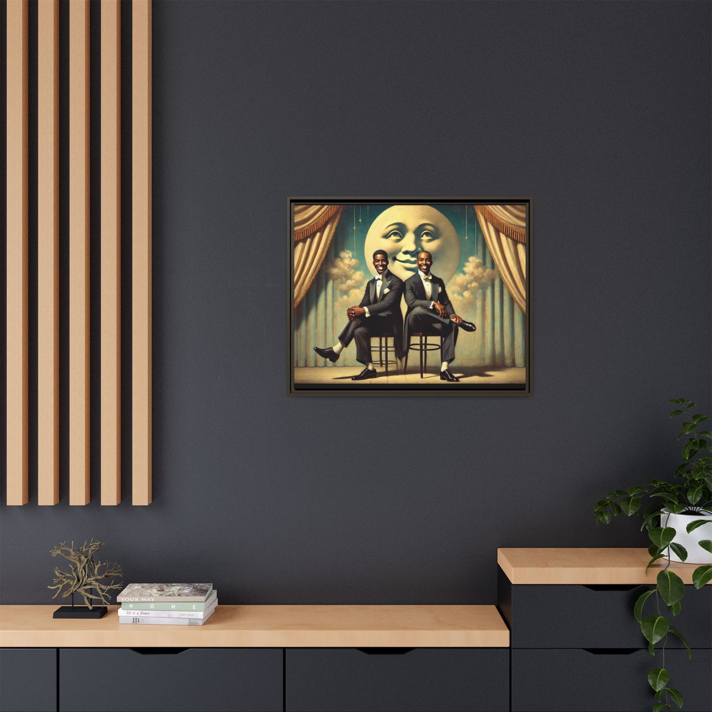 Framed vintage-style portrait of two Black men in tuxedos seated under a smiling crescent moon prop with golden curtains and cloud backdrop. This restored matte canvas honors lost LGBTQ history and reclaims early 20th-century queer representation with pride.