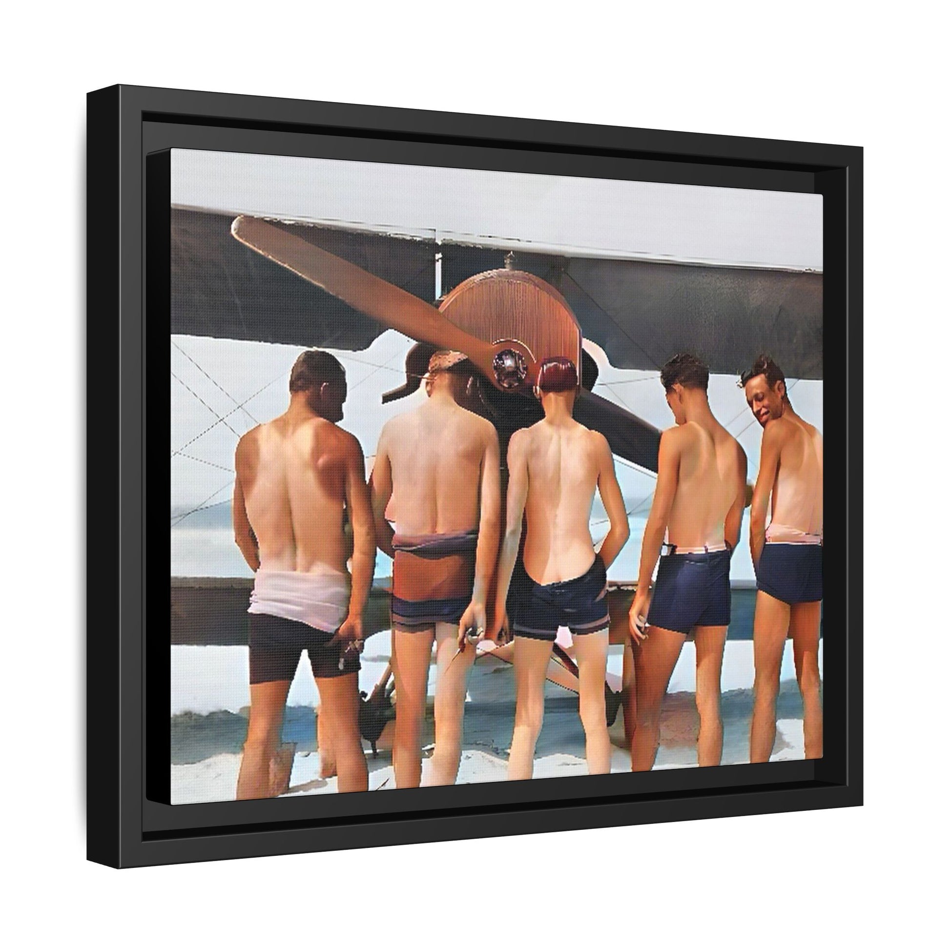 A beautifully restored vintage photograph of five men standing on a sunlit Key West beach with a vintage aircraft in the background. This nostalgic canvas print captures coastal adventure, camaraderie, and the free spirit of aviation history. Men urinating