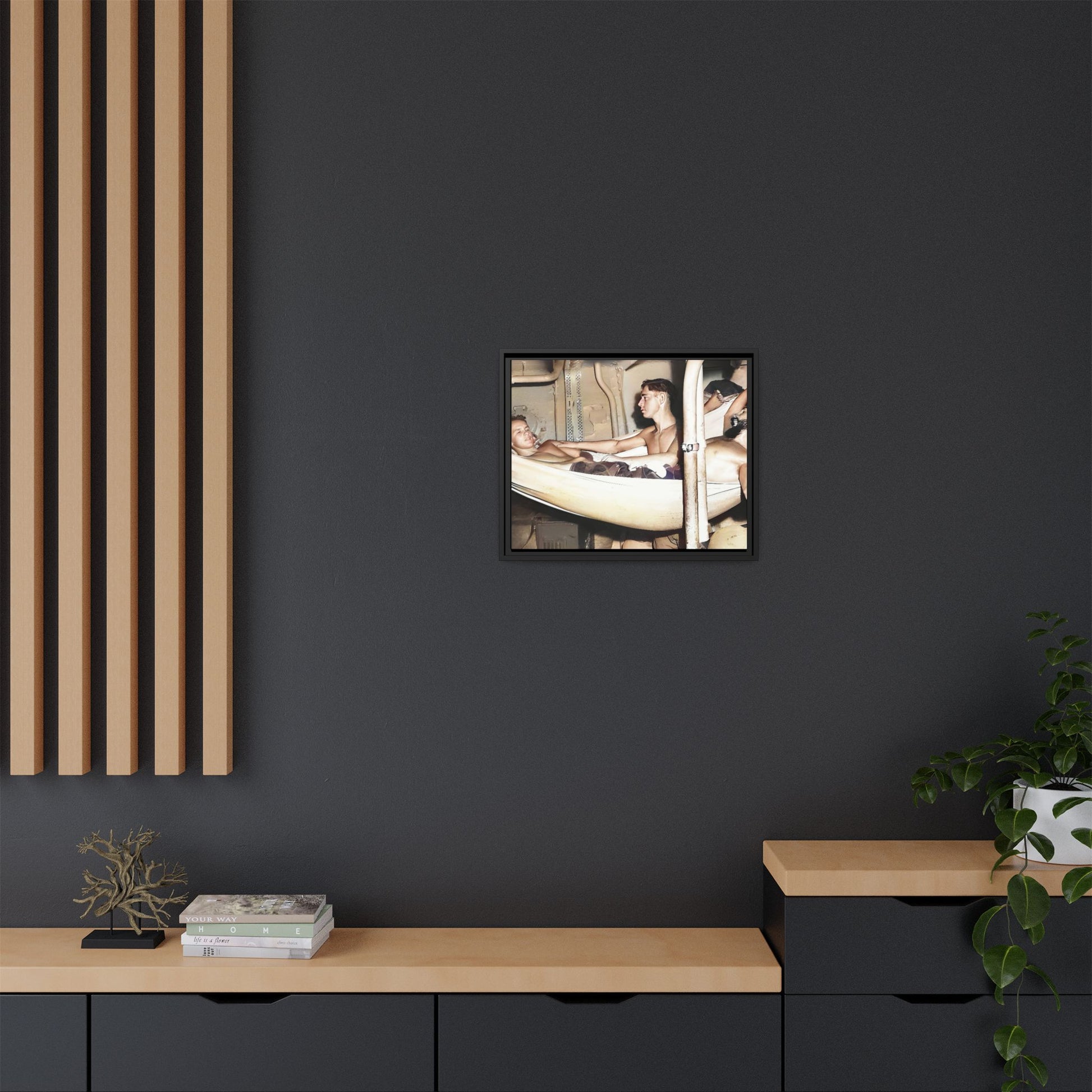 A framed vintage maritime photo on matte canvas featuring sailors aboard the Orleans, capturing life at sea and camaraderie.