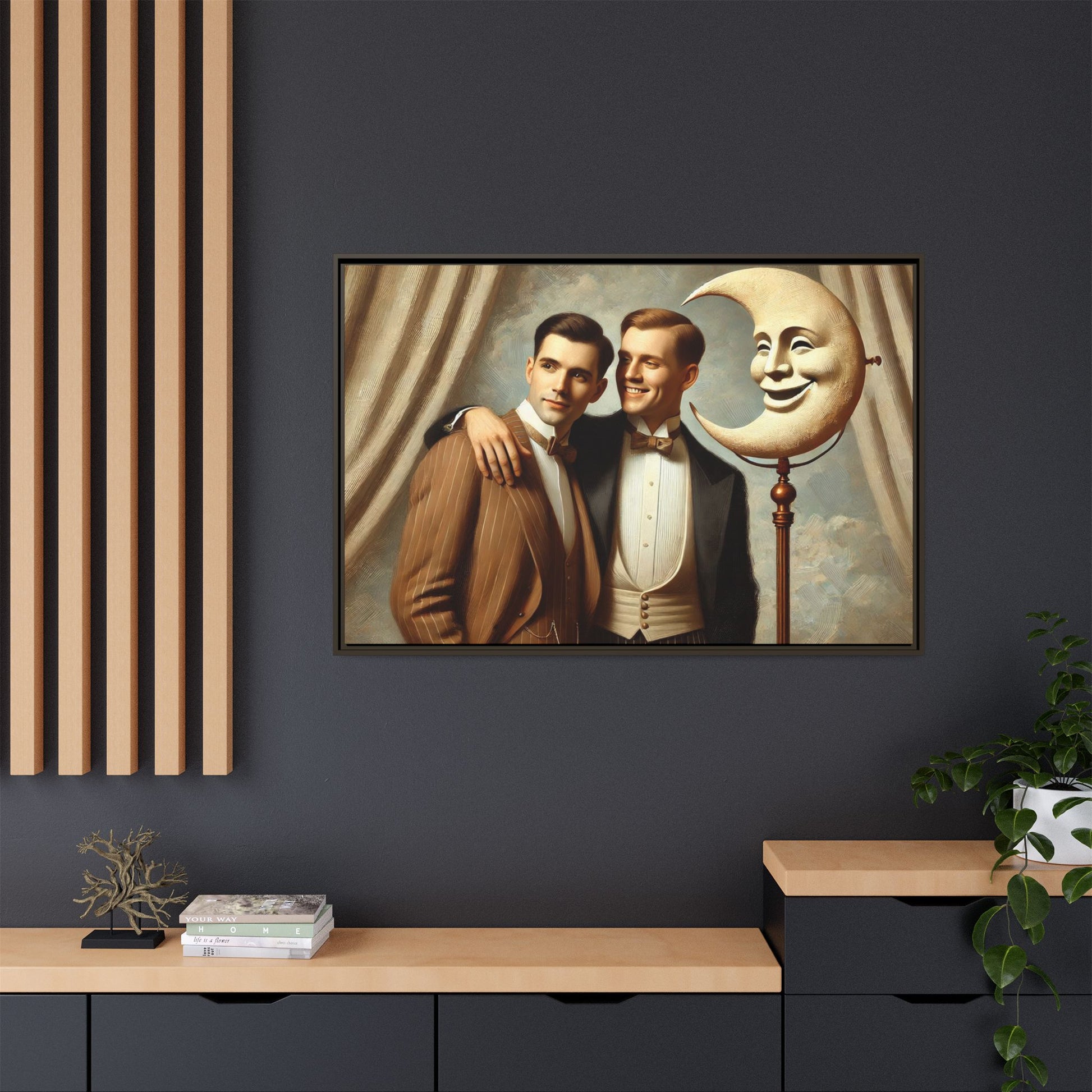 Framed matte canvas artwork of two men in vintage tuxedos standing beside a crescent moon prop. This piece reclaims LGBTQ+ representation lost to bias and honors everyday moments of affection and connection once absent from historical archives.
