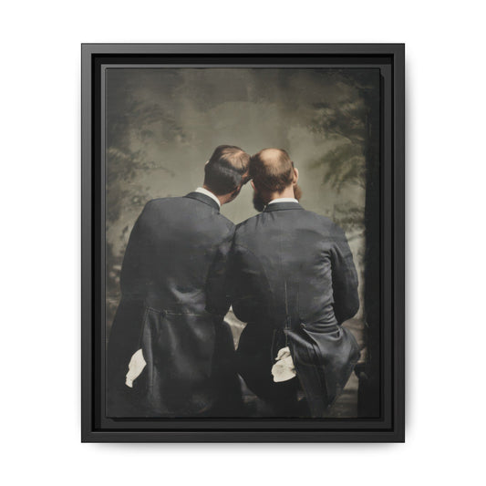 Vintage rear view portrait of two formally dressed men seated closely together