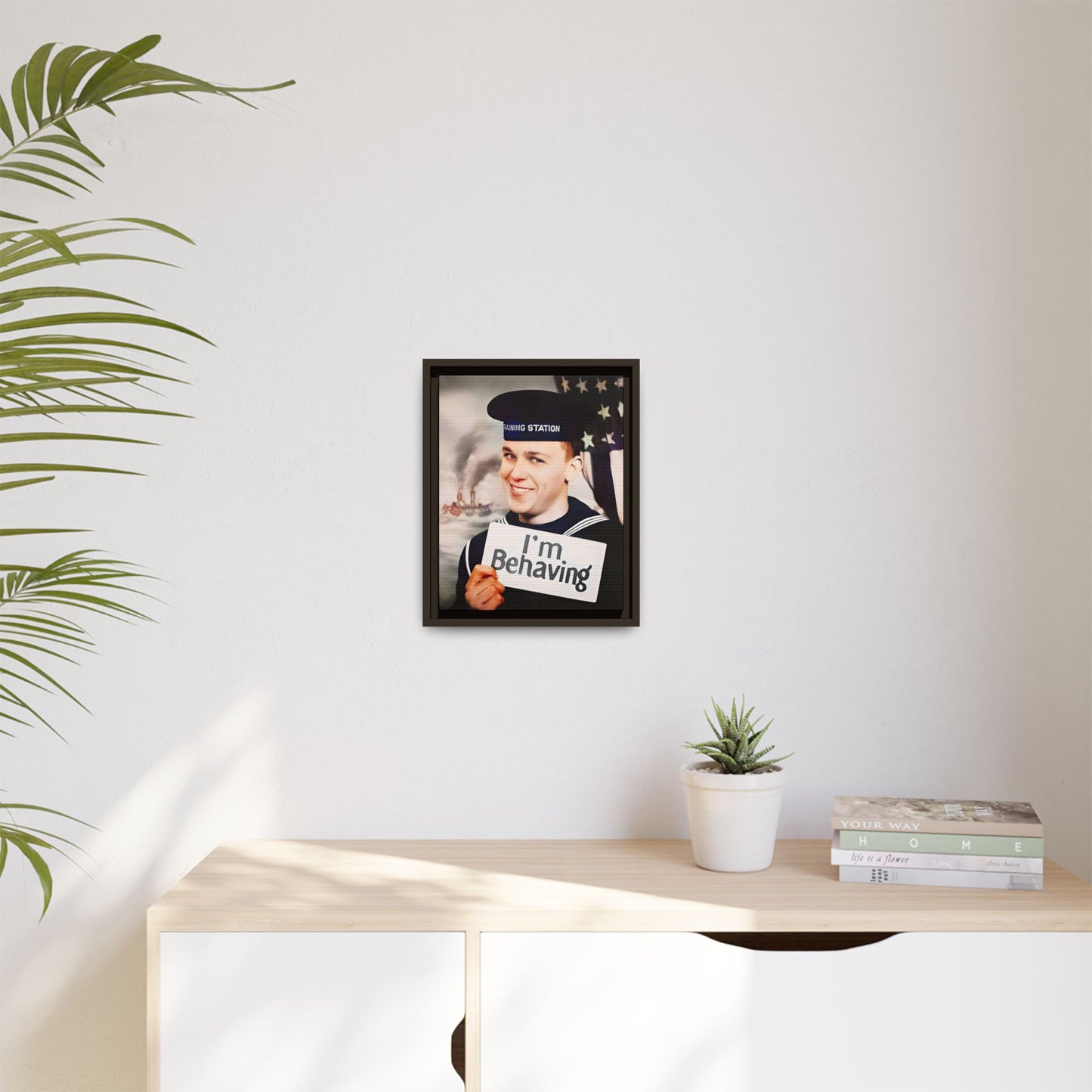 A vintage U.S. Navy sailor portrait featuring Carl at the Washington Navy Yard, grinning while holding a card reading "I'm Behaving." This framed matte canvas print is a charming mix of humor and military history, perfect for collectors and veterans.