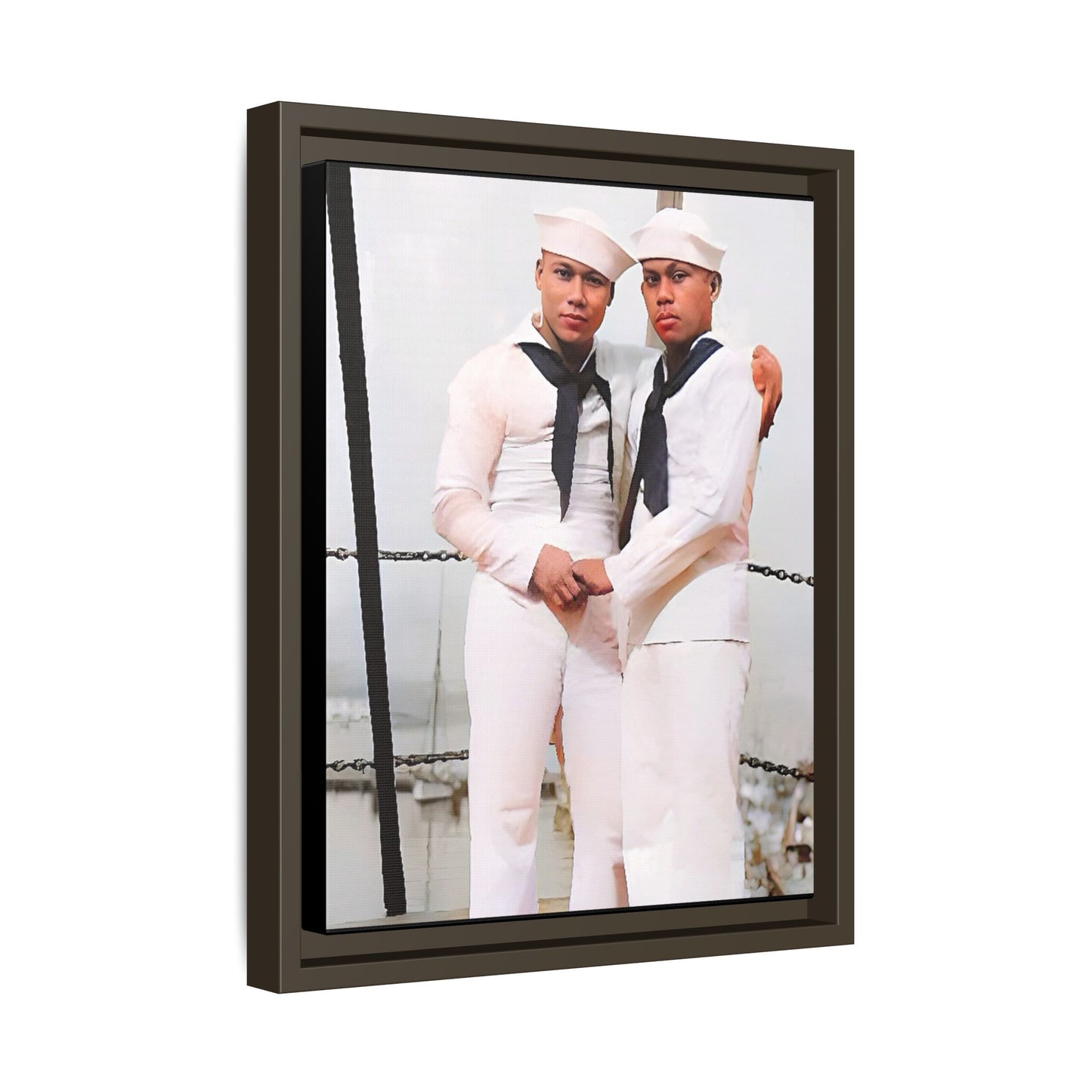 A restored vintage photograph of two Navy sailors standing together aboard a naval ship at Apra Harbor, Guam. Dressed in crisp white uniforms, their hands gently clasped, the image captures a quiet moment of strength, devotion, and LGBTQ+ military history.