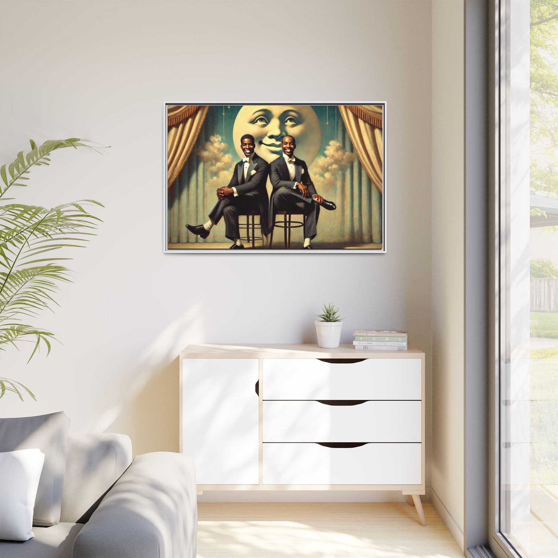 Framed vintage-style portrait of two Black men in tuxedos seated under a smiling crescent moon prop with golden curtains and cloud backdrop. This restored matte canvas honors lost LGBTQ history and reclaims early 20th-century queer representation with pride.