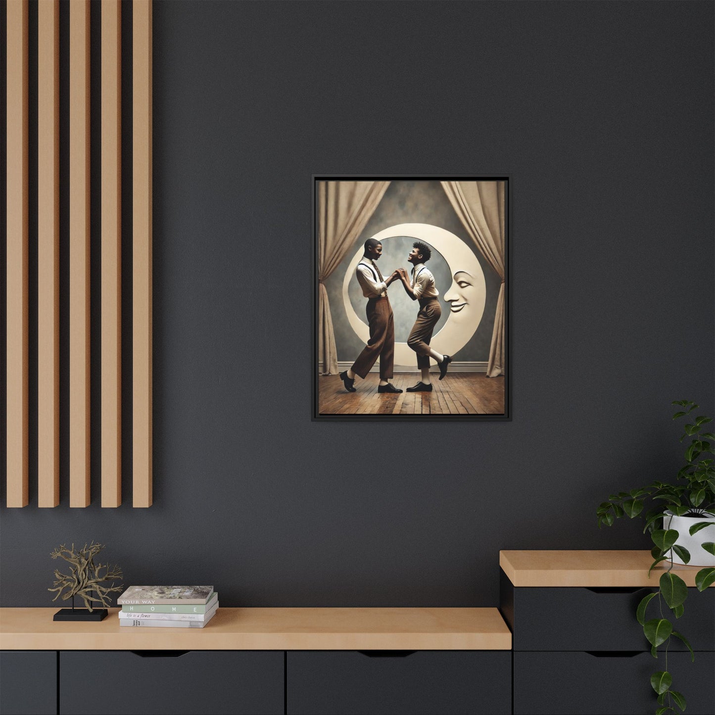 Two joyful young Black men dressed in 1920s fashion dancing in front of a crescent moon prop with a smiling face. This artwork reclaims erased queer love, offering a whimsical and powerful celebration of Black LGBTQ+ youth and history.