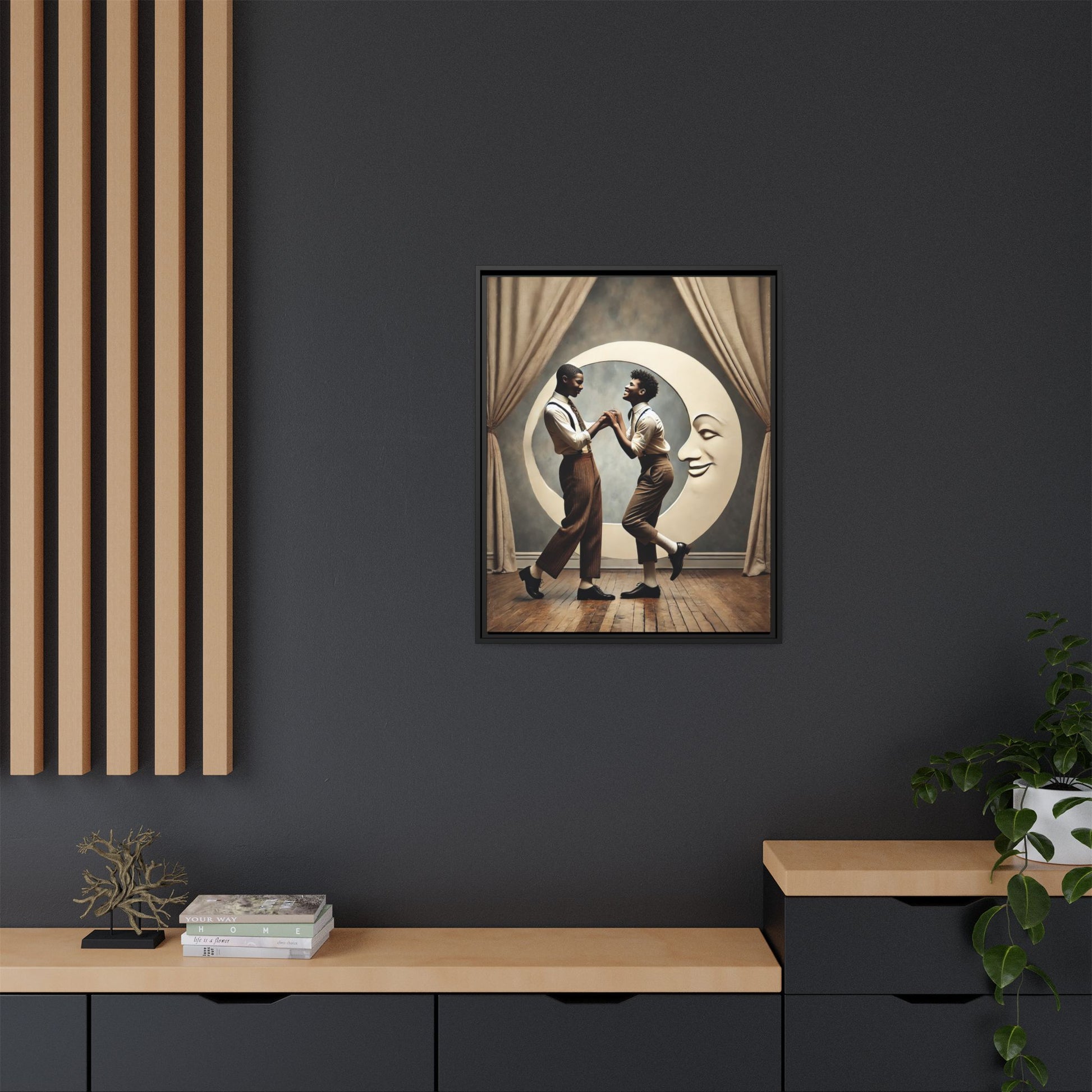 Two joyful young Black men dressed in 1920s fashion dancing in front of a crescent moon prop with a smiling face. This artwork reclaims erased queer love, offering a whimsical and powerful celebration of Black LGBTQ+ youth and history.