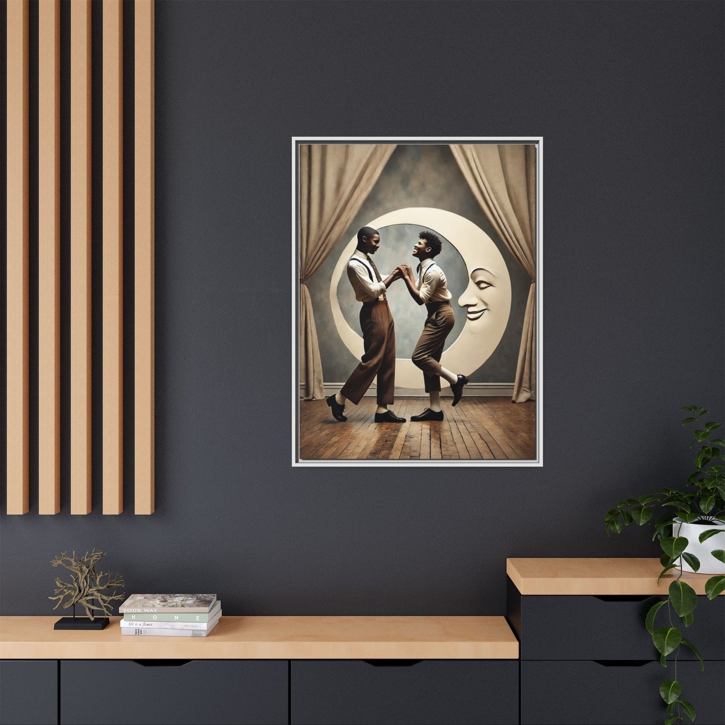 Two joyful young Black men dressed in 1920s fashion dancing in front of a crescent moon prop with a smiling face. This artwork reclaims erased queer love, offering a whimsical and powerful celebration of Black LGBTQ+ youth and history.